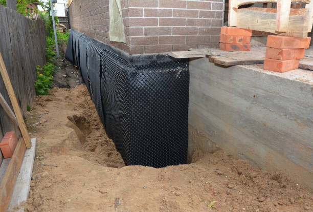 Happy homeowners after waterproofing job in Browns Mills